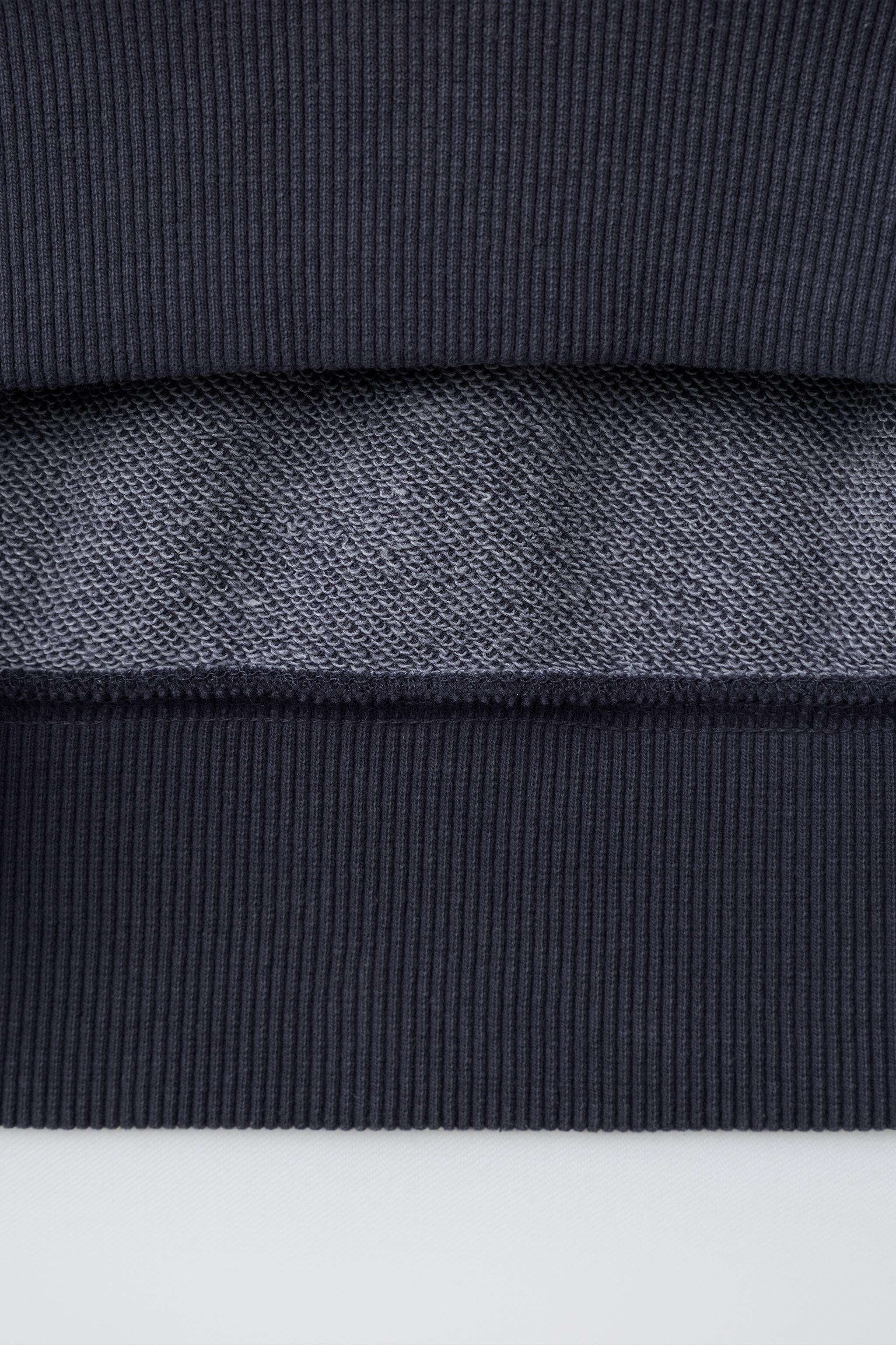 CONTRAST COLLAR SWEATSHIRT WITH CUTOUTS